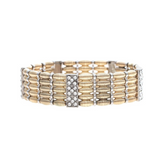 The A-Train Gold Silver Woven Texture Bead with Pave Crystal Bracelet features multiple rows of gold and silver links in a woven texture, accented with rectangular sections adorned with sparkling pave crystals.