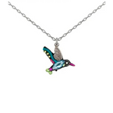 The Hummingbird Multi-Color Pendant Necklace from Firefly features a silver chain and a vibrant hummingbird pendant adorned with blue, green, yellow, pink, and black accents. Handmade in Guatemala by Firefly Jewelry, this necklace adds an artistic and colorful touch to any ensemble.