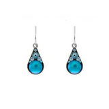A pair of Firefly's Moonlight Drop Light Blue Earrings featuring teardrop-shaped blue gemstones accented with small round blue crystals at the top—perfect for adding a touch of elegance to your jewelry collection.
