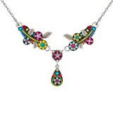 Introducing the Scalloped Multi-Color Flower w/Drop Necklace by Firefly—an artisanal piece featuring vibrant jeweled flowers, silver leaves, and a sparkling teardrop pendant on a silver chain. Handmade under fair-trade practices, this necklace from Firefly Jewelry combines vivid color with ethical craftsmanship for a truly stunning statement accessory.
