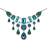 Firefly Kensington Elaborate Style Necklace- Bermuda Blue featuring teardrop and rectangular crystals set in silver-tone metal with multicolored accents.