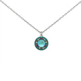Firefly Kensington Round Necklace- Bermuda Blue featuring a silver, round pendant with a central blue cabochon stone surrounded by a ring of multicolored crystals.