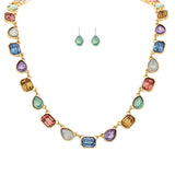 A-Train Gold Multi-Color Linked Gems Necklace Set features a necklace and matching green drop earrings, elegantly displayed on a white background.