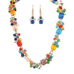 The A-Train Gold Multi Bauble Chunky Bead Necklace Set features a gold chain necklace with bold, colorful bauble beads and matching earrings, perfect for adding vibrant style to any look.