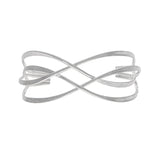 The A-Train Silver Hammered Wire Cuff Bracelet features an open design with two overlapping curved bands forming an abstract infinity symbol, offering adjustable fit and everyday elegance.