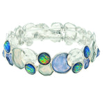 The A-Train Silver Blue & Gray Bubbles Bracelet showcases irregular textured mixed metals and iridescent opal stones arranged in a repeating pattern for a stylish, versatile look.