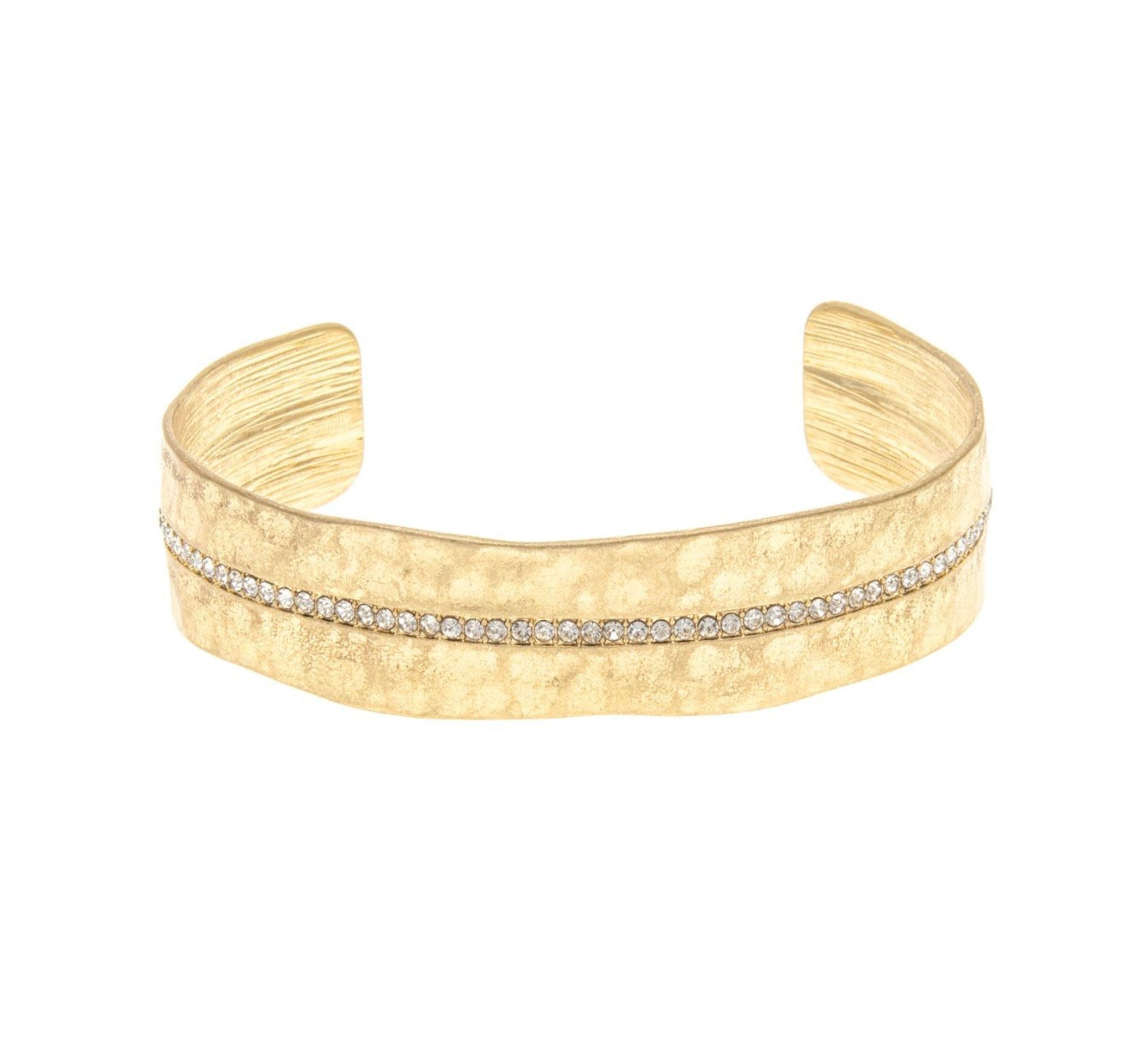 The A-Train Gold Crystal Row Cuff Bracelet features a single row of sparkling white stones set along the center and offers an adjustable fit with its flexible cuff design.