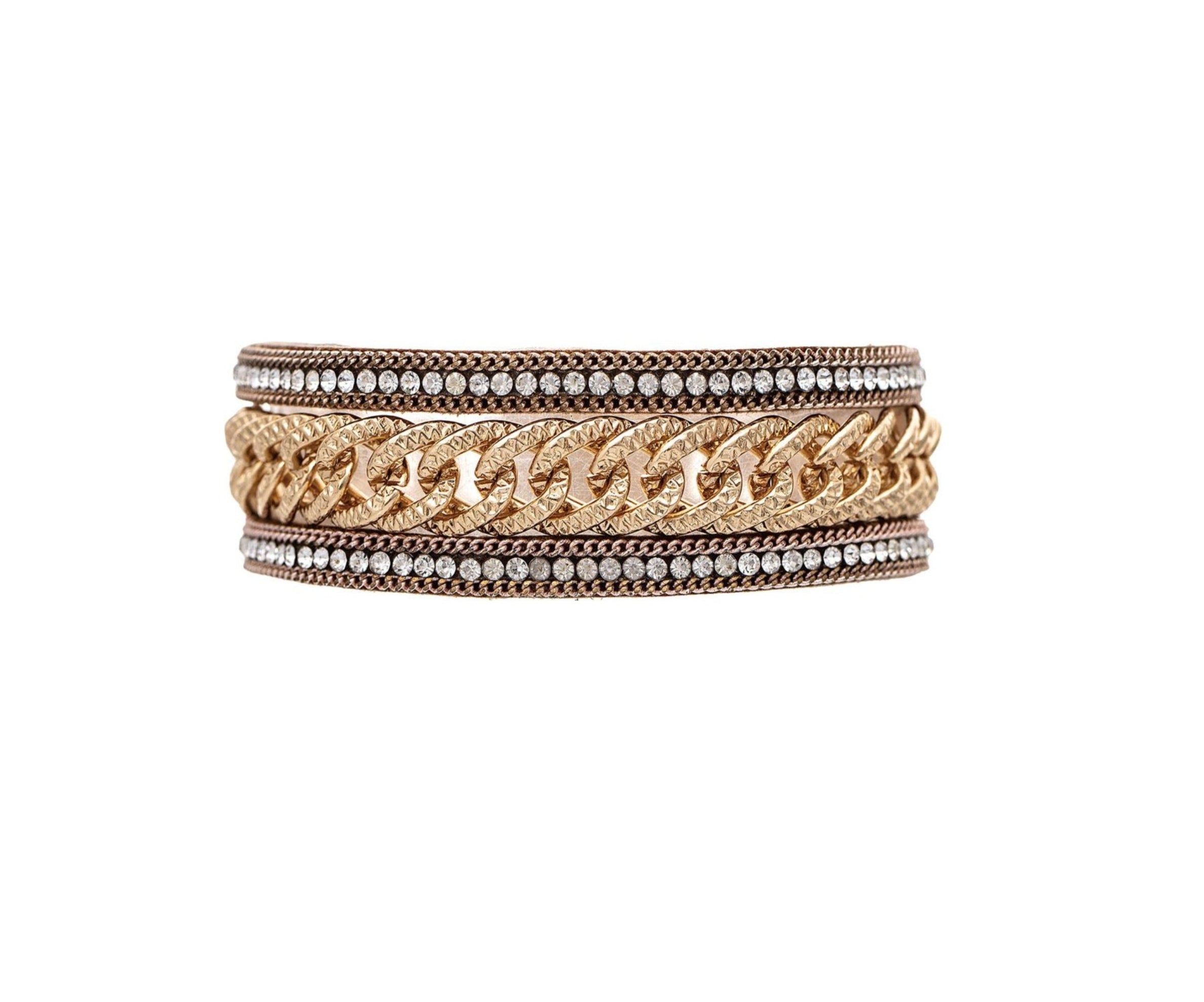 The A-Train Gold Crystal Edge Heavy Chain Bracelet features a bold central chain-link design with intricate metallic patterns and sparkling crystal accents, all set against a white background.