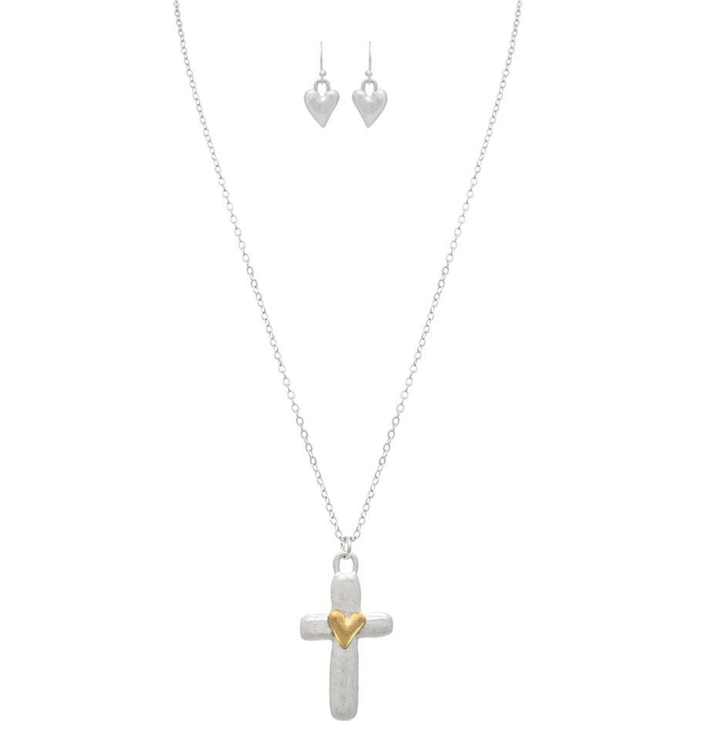 The A-Train Two-Toned Puffy Heart on Cross Necklace Set features a necklace with a gold-accented puffy heart on a cross and matching silver heart earrings—ideal for any occasion.