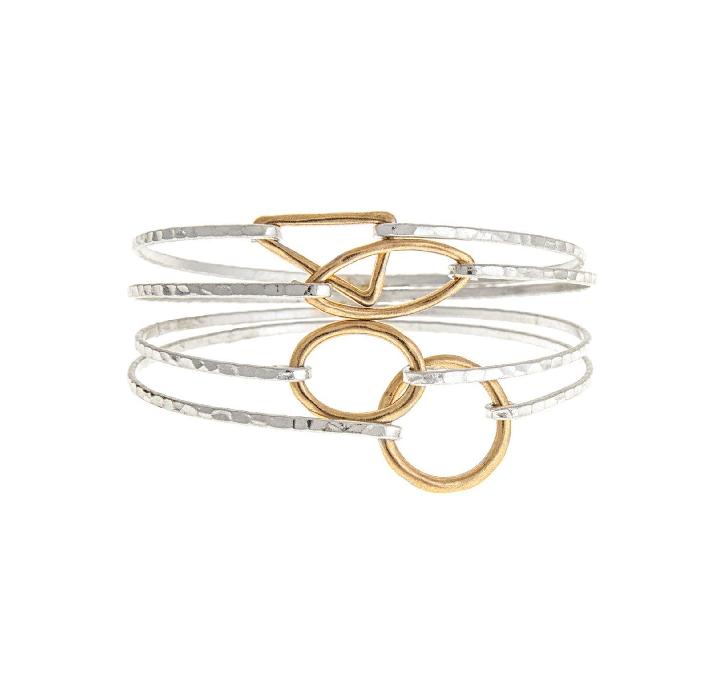 The A-Train Two-Toned 4 Piece Hook Bangle Set Bracelet features mixed metals and gold-toned accents, offering a unique and striking look with its layered design.