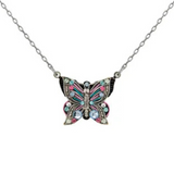 Introducing the Filigree Butterfly Necklace Light Blue by Firefly Jewelry. This beautiful silver necklace features a butterfly pendant adorned in delicate light blue with intricate patterns and sparkling gemstones. Expertly handcrafted by fair-trade artisan creators from Firefly, it showcases exquisite craftsmanship and refined detailing—a true testament to artisanal skill and design.
