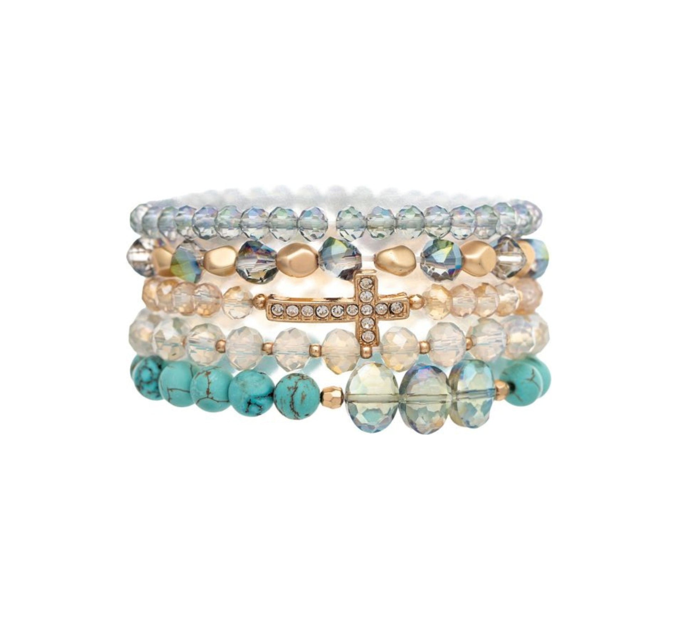 The A-Train Gold Mixed Beads Cross 5 Pc Set Bracelet includes clear, gold, and turquoise beaded bracelets plus a gold mixed beads bracelet with a rhinestone-encrusted sideways cross.