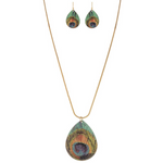 A-Train Gold Peacock Necklace Set: Elegant mixed-metal necklace and earrings with large teardrop pendants, showcasing vibrant green, blue, and bronze peacock feather patterns for a coordinated look.