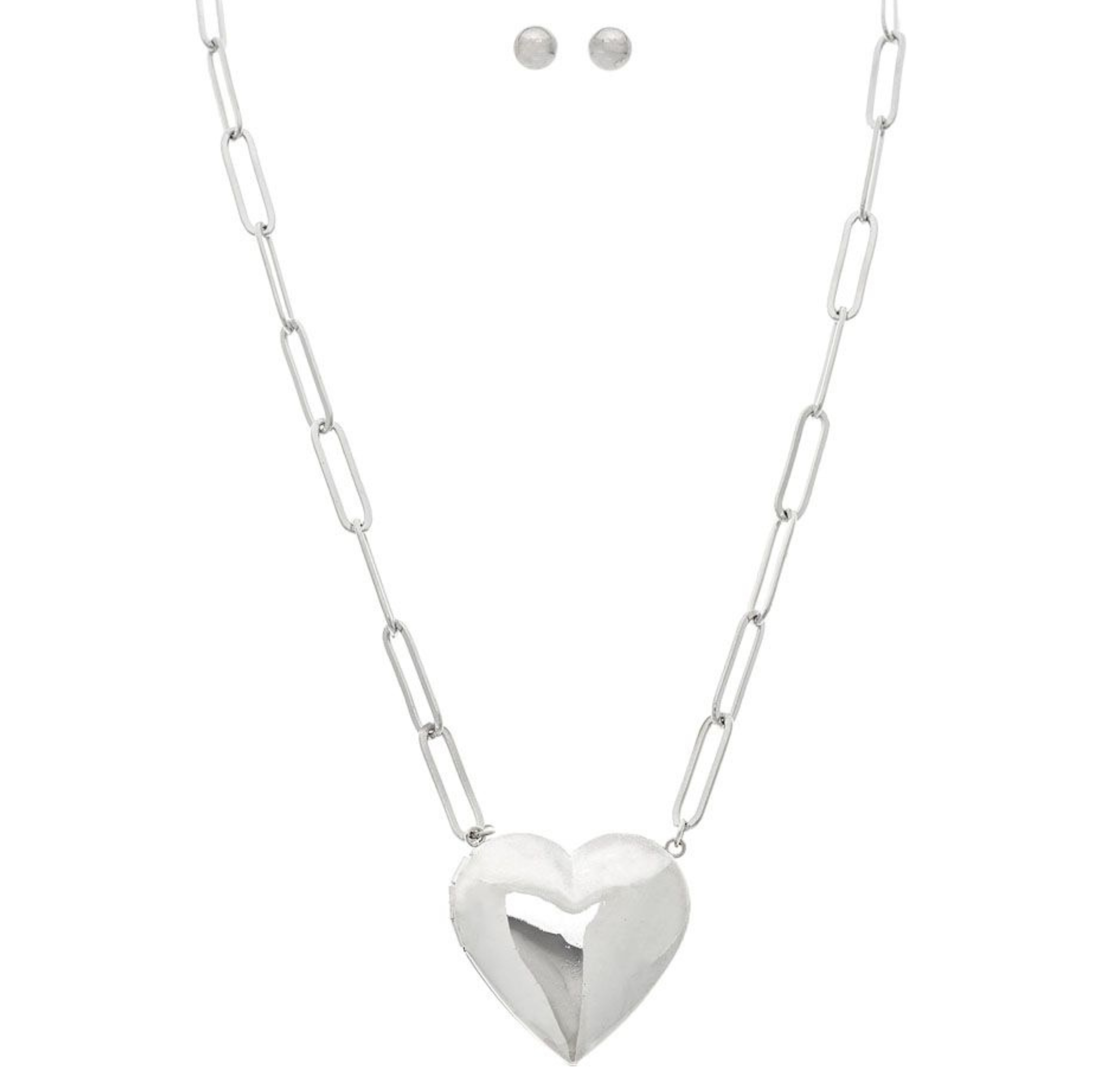 The A-Train Silver Puffy Heart Locket Chain Necklace Set features elongated links, a shiny puffed heart pendant, and matching stud earrings—displayed on a white background.