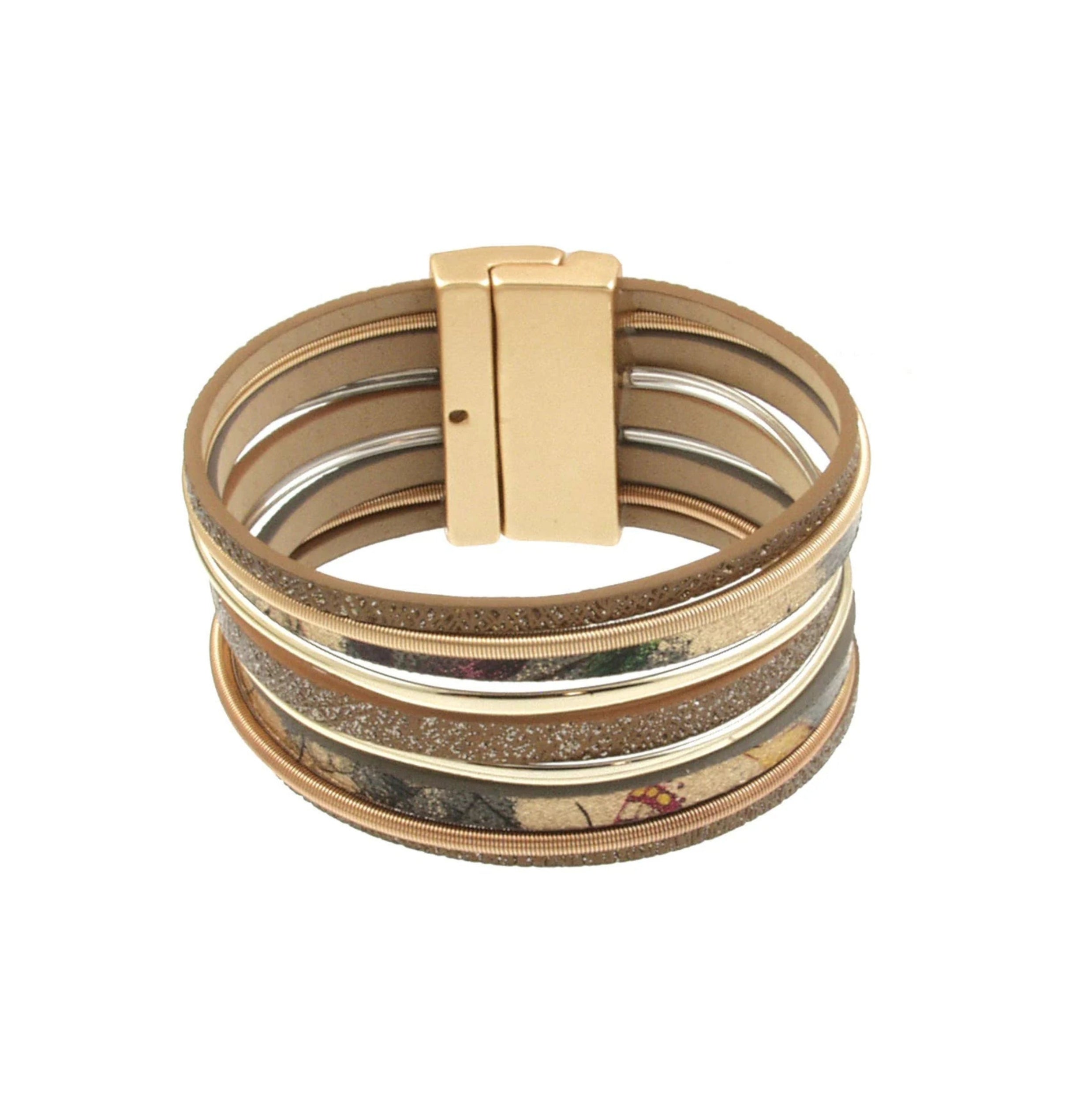 The Matte Gold/Shiny Gold Magnetic Bracelet by Origin features multi-layered silver, matte gold, and shiny gold bands with textured and glitter details, plus a magnetic clasp for easy wear. This elegant bracelet offers a stacked, stylish look.