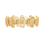 The A-Train Gold Linked Flower Cutouts ring features detailed petal designs crafted from mixed jeweler’s metals, showcased against a white background.