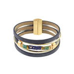 The Origin Matte Gold & Navy w/Blue & Aqua Glass Beads Magnetic Bracelet features navy bands, matte gold accents, blue and aqua glass beads, and a secure magnetic clasp for stylish everyday wear.
