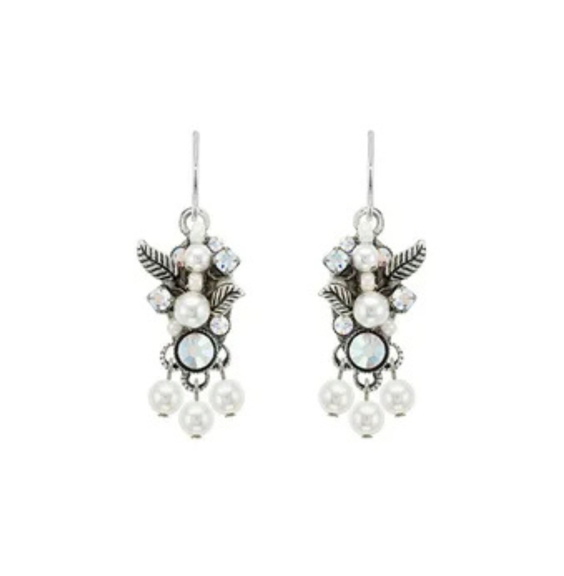 Adorned with crystal accents and delicate leaf details, the Flora w/ Triple Glass Pearls White earrings by Firefly feature three elegant dangling glass pearls in a handmade, vintage-inspired design—capturing the timeless elegance that defines Firefly Jewelry.