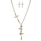 The Two-Toned Hammered Cross Necklace Set by A-Train showcases overlapping gold and silver textured crosses, paired with matching dangle earrings for a bold look.