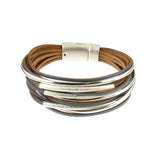 The Origin Matte Silver/Navy Multi Magnetic Bracelet features navy leather with curved matte silver tubes and a secure magnetic clasp for a stylish, layered look.