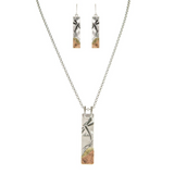 The A-Train Multi Metal Dragonfly Landscape Necklace Set features matching necklace and earrings with rectangular silver-tone pendants, etched with a nature-inspired design and accented with gold and copper details.