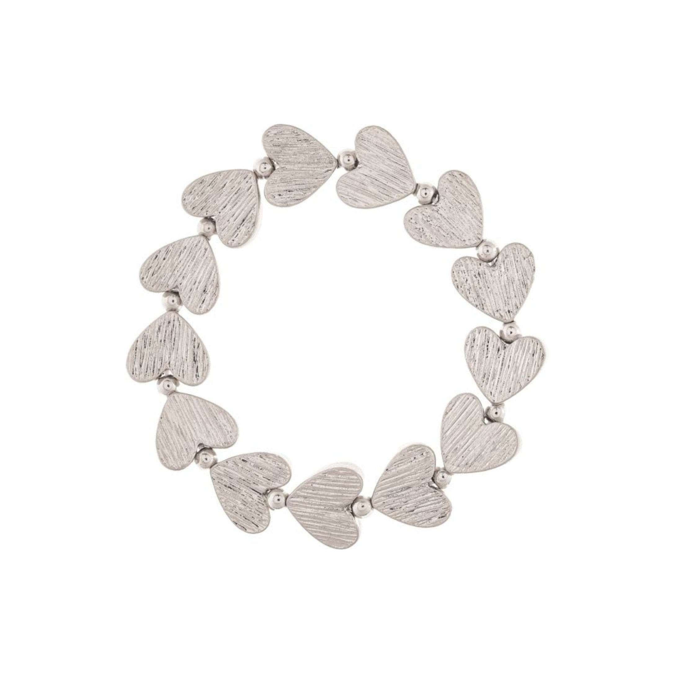 The A-Train Silver Line Etched Hearts Stretch Bracelet features silver heart-shaped links and small beads in a flexible, easy-to-wear design.