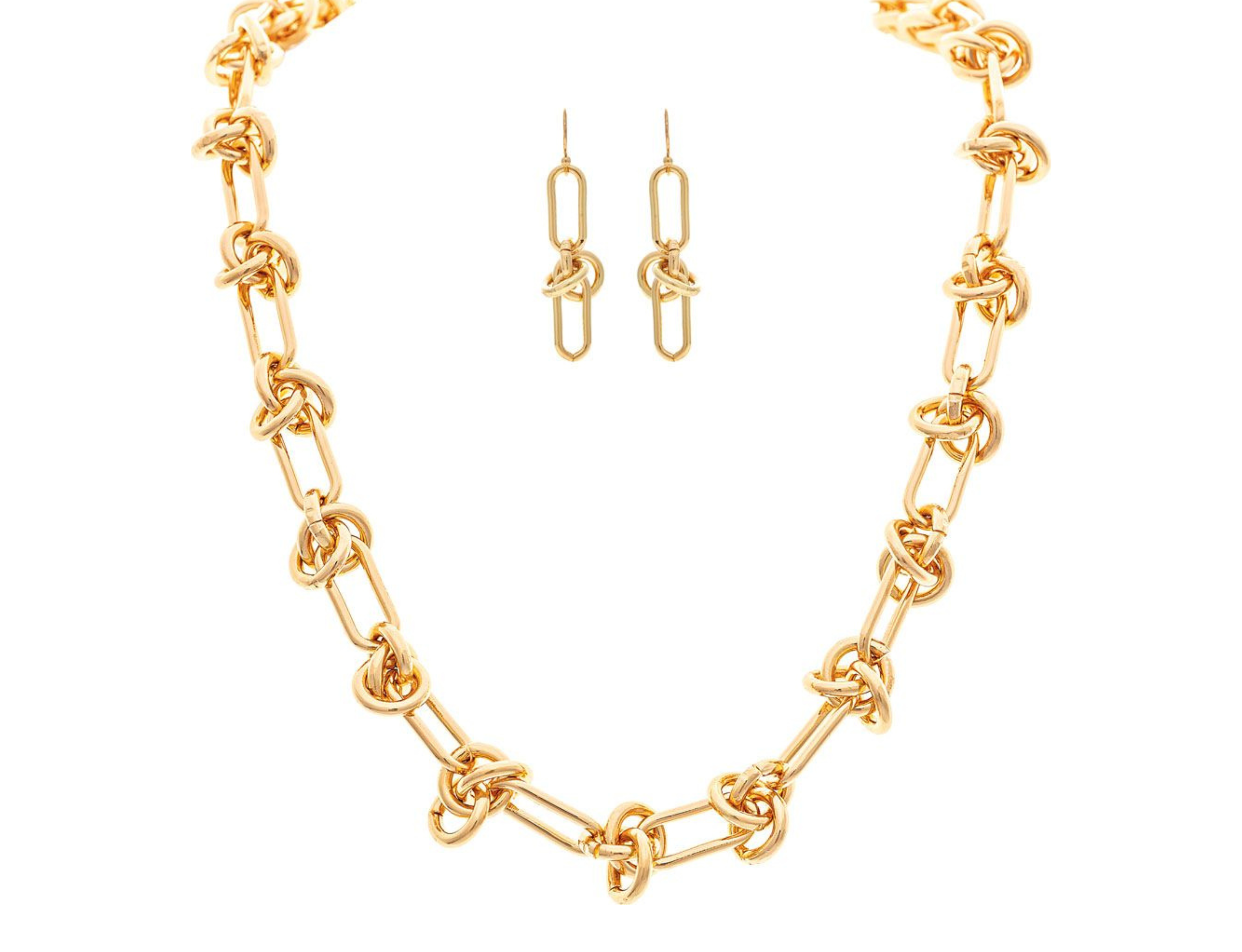 A-Train Gold Bar & Circle Bundle Chain Link Necklace Set features bold, knotted links and matching drop earrings with elongated ovals, showcasing mixed jeweler’s metals for a modern, elegant look on a white background.