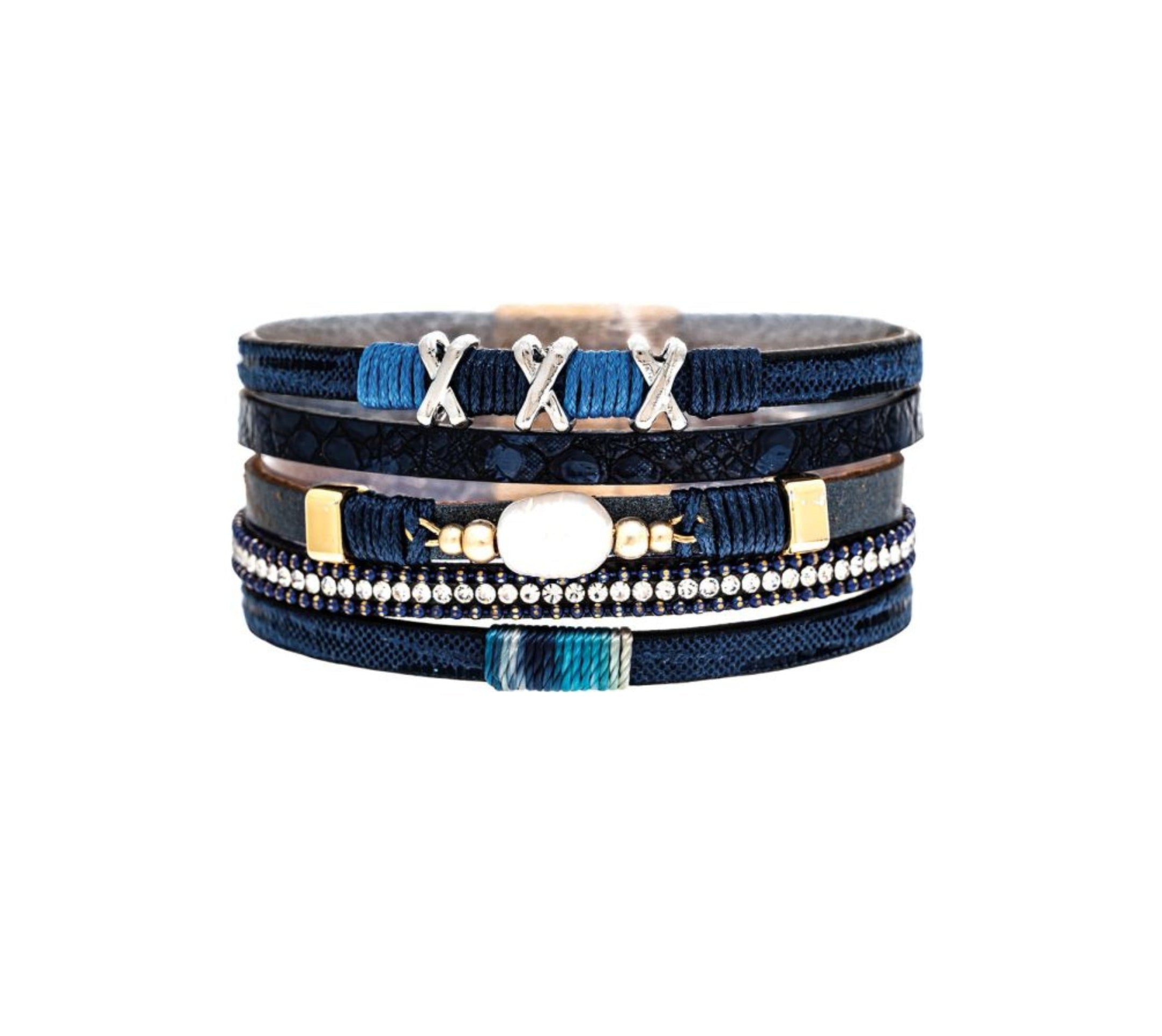 A-Train’s Silver Blue Pearl Crystal XXX Magnetic Bracelet features blue and navy layers, gold accents, and an oval white stone centerpiece—arranged on a white background. A perfect addition to your stylish jewelry collection.