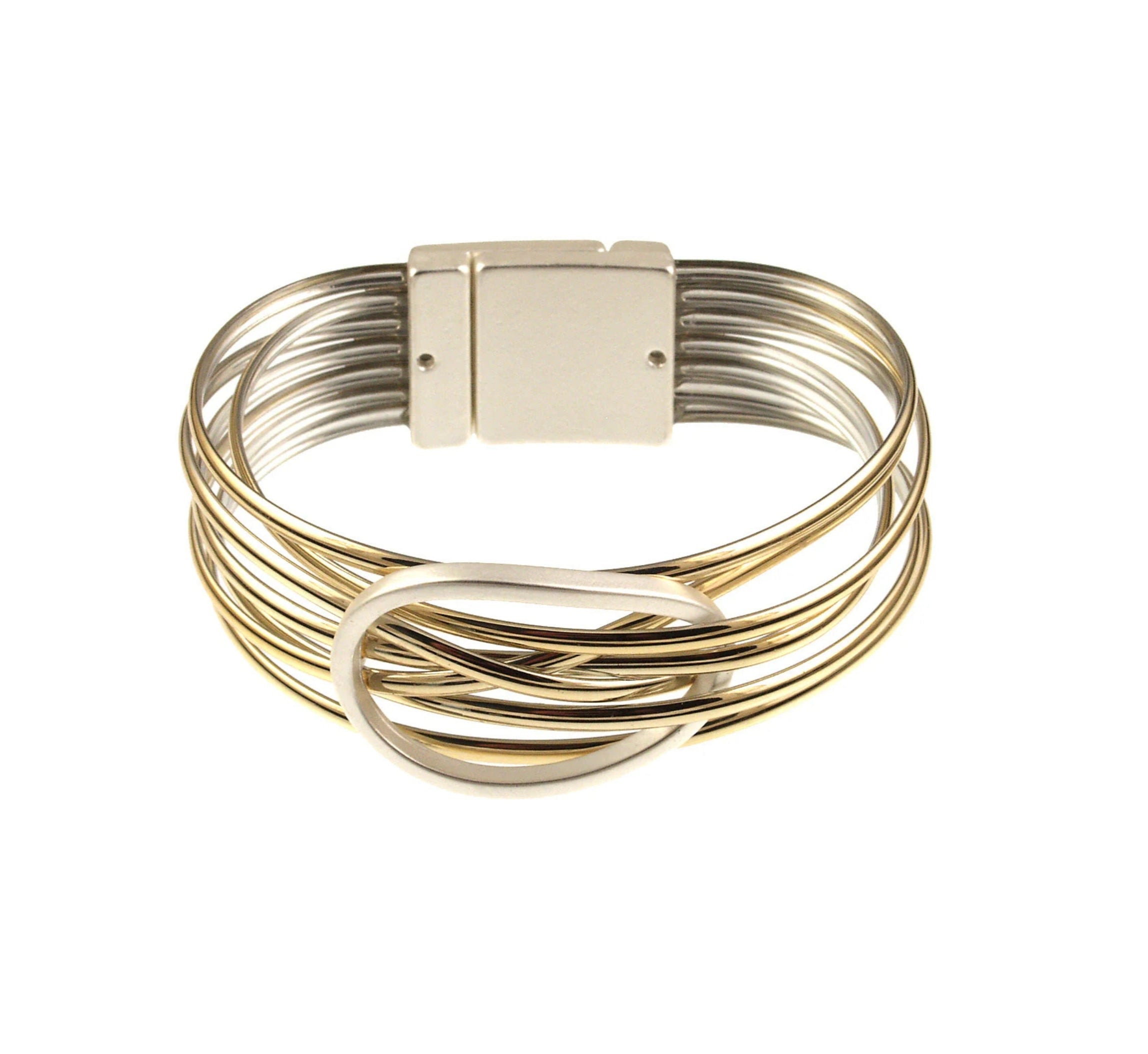 The Origin Shiny Gold Strand/Silver Circle Focal Magnetic Bracelet features shiny gold strands, silver metal bands, a rectangular clasp, and a bold silver circle centerpiece.