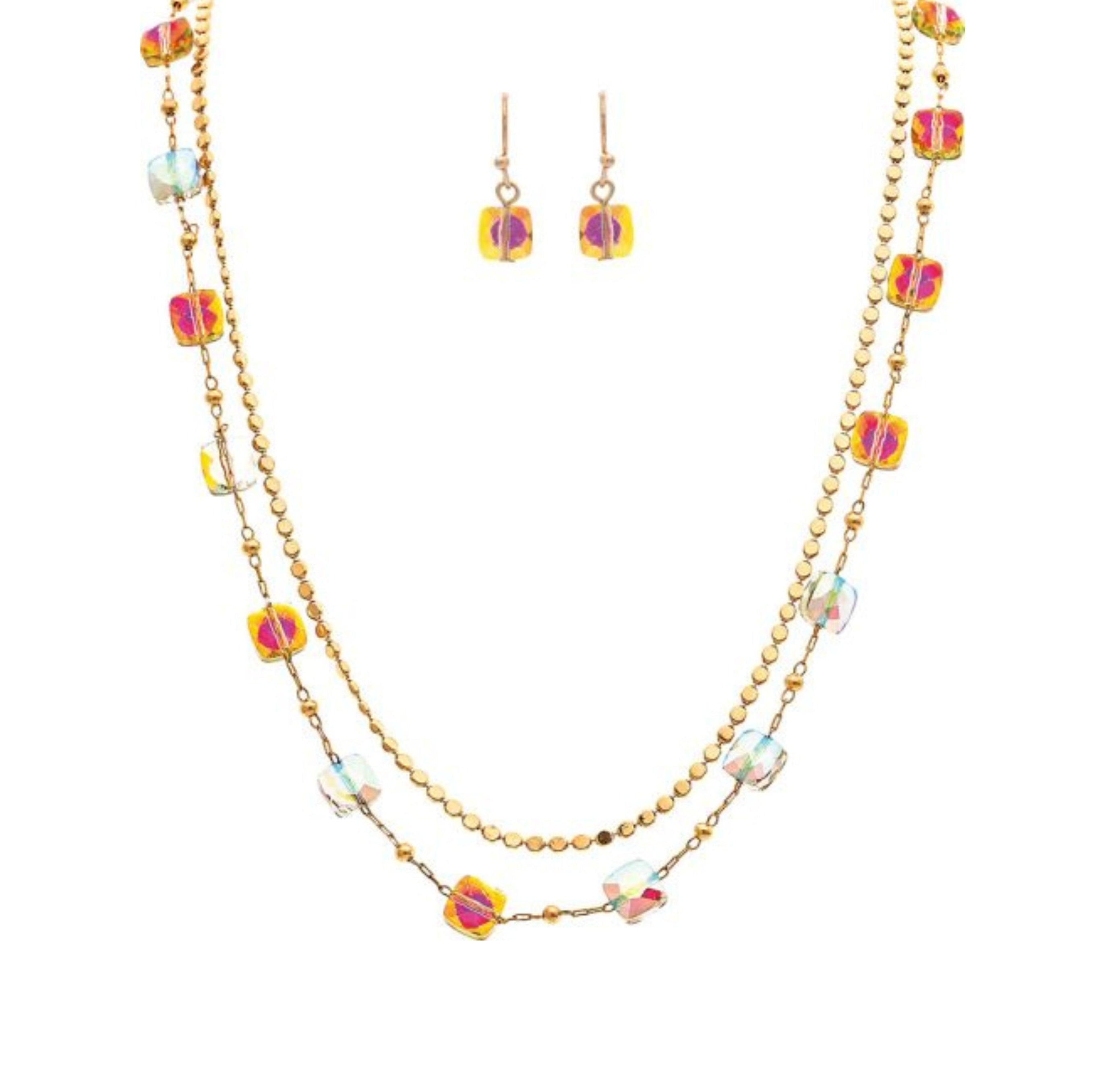 A-Train Gold Aurora Borealis Coated Glass Beaded Chain Necklace Set features a double-layer necklace and matching dangle earrings with sparkling iridescent cube beads, shown on a white background.