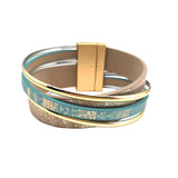 Origins Matte Gold & Aqua Print Magnetic Bracelet features matte gold, turquoise, and beige bands with gold accents and a rectangular gold clasp, shown on a white background.