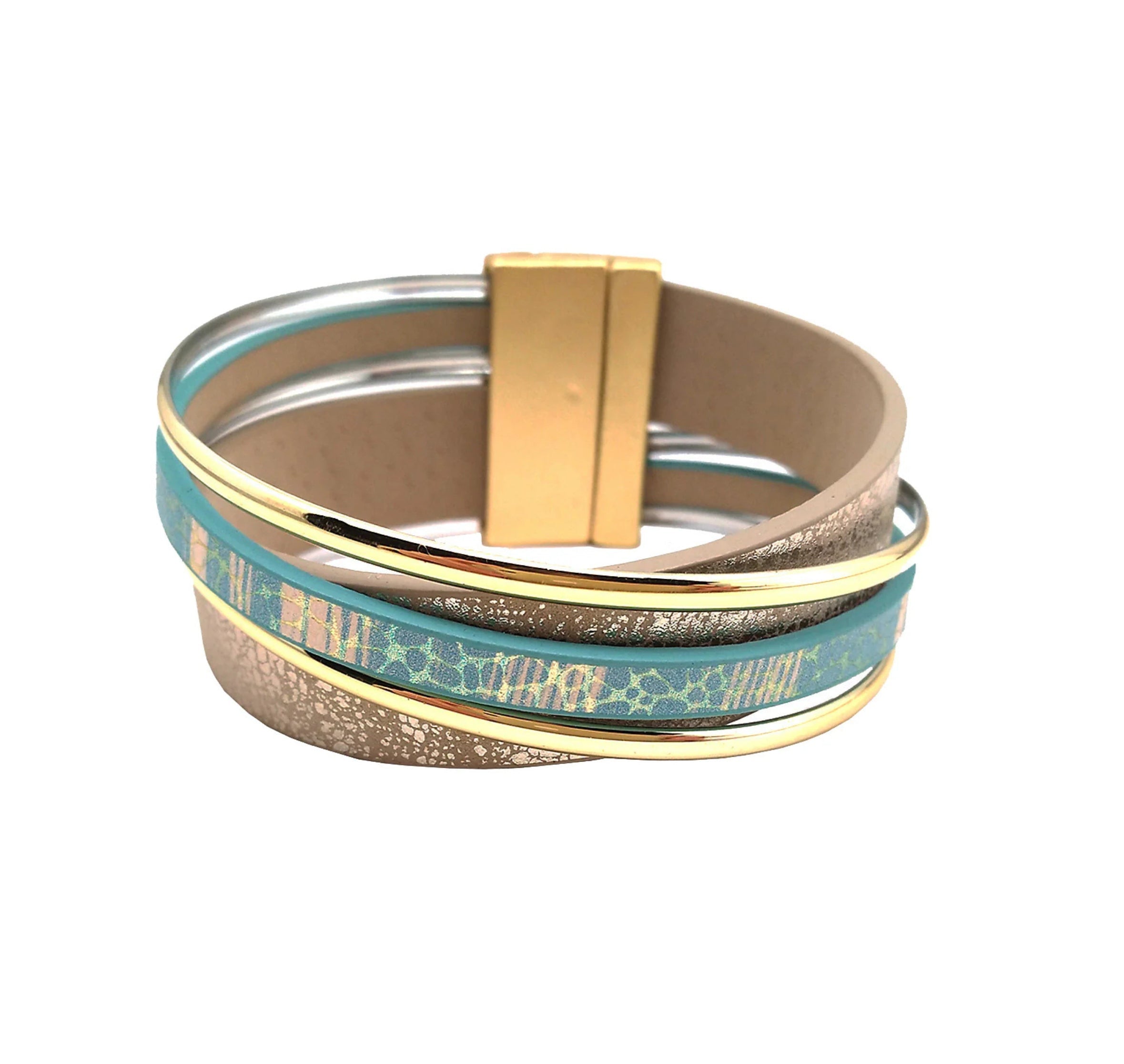 Origins Matte Gold & Aqua Print Magnetic Bracelet features matte gold, turquoise, and beige bands with gold accents and a rectangular gold clasp, shown on a white background.