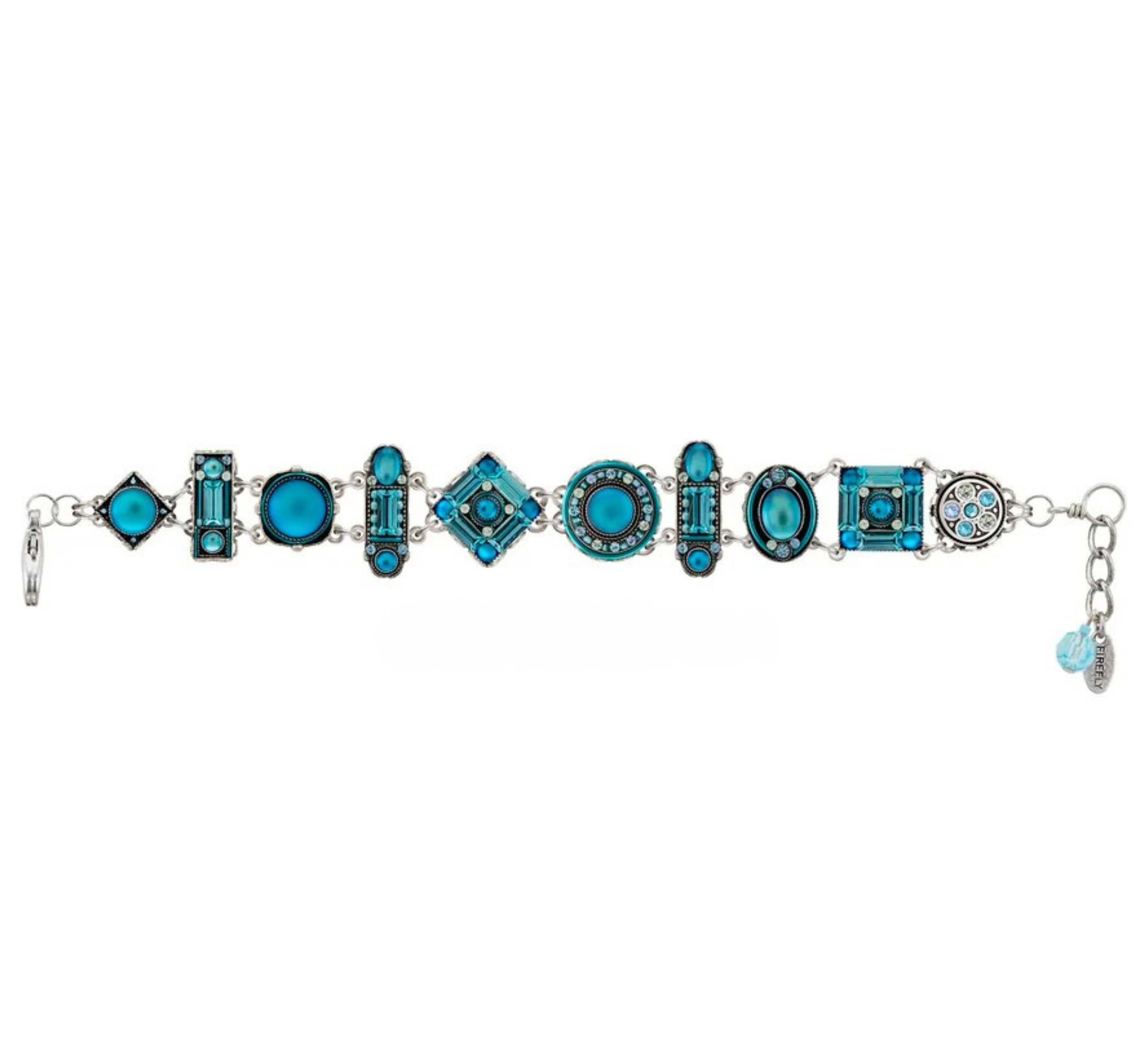 The La Dolce Vita Moonlight Light Blue Bracelet by Firefly is a stunning silver piece adorned with an array of light blue and turquoise geometric gems—circles, squares, rectangles, and ovals—each arranged in a harmonious repeating pattern. Handmade and thoughtfully crafted as fair-trade jewelry, this bracelet beautifully captures the elegance of artisan Firefly design.