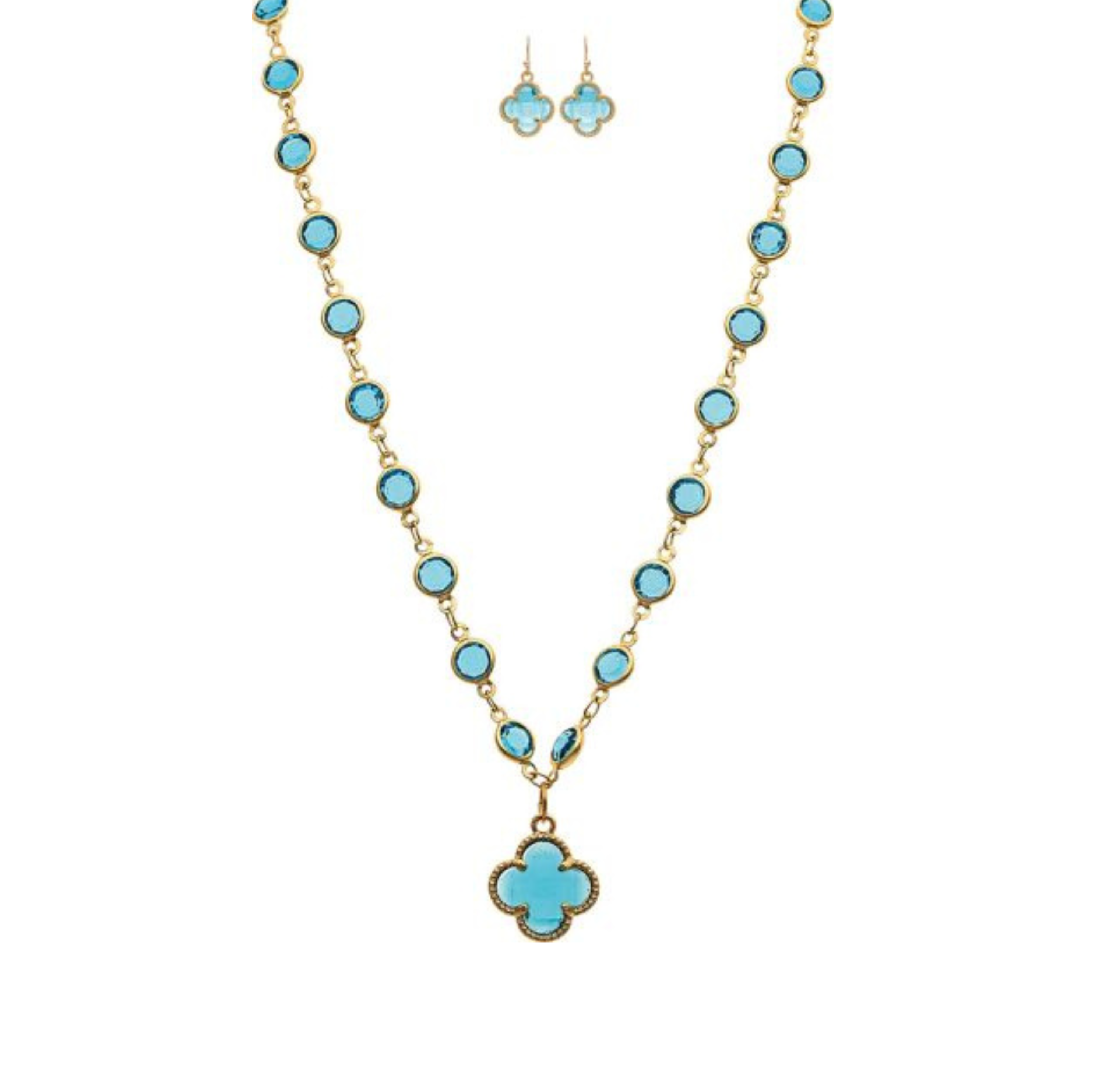 A-Trains Gold Blue Crystal By The Inch Clover Charm Necklace Set features a gold necklace with turquoise stones and a clover charm, paired with matching turquoise and gold dangle earrings, beautifully displayed on a white background.