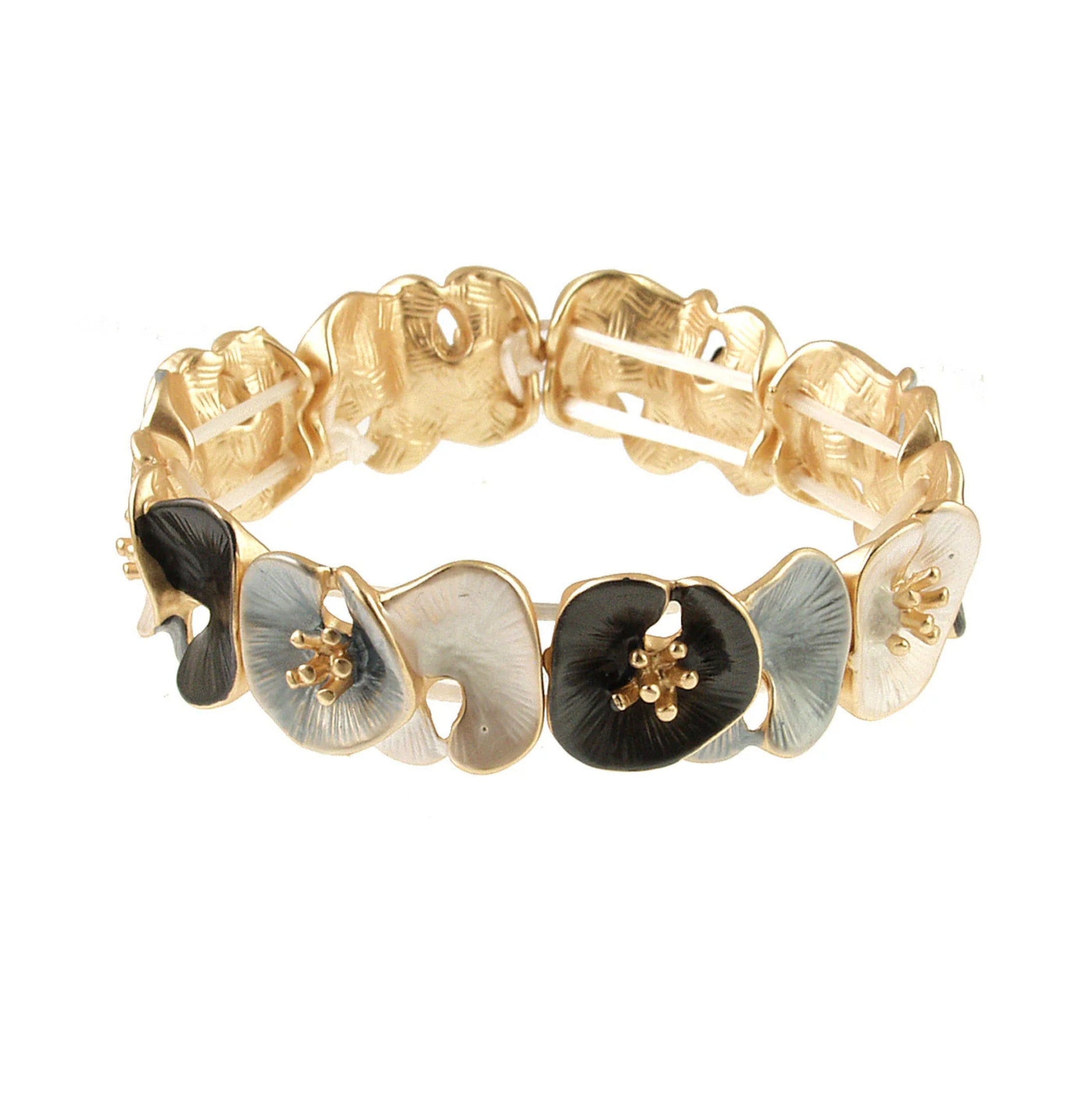 Origins Matte Silver, Gold, White & Gray Lily Pad Bracelet features interconnected, textured flower shapes with raised gold centers—a sophisticated accessory perfect for special occasions.