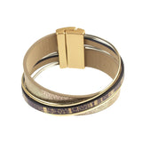 The Origin Light Matte Gold & Navy Blue Print Magnetic Bracelet features multiple stylish bands and a rectangular gold clasp.