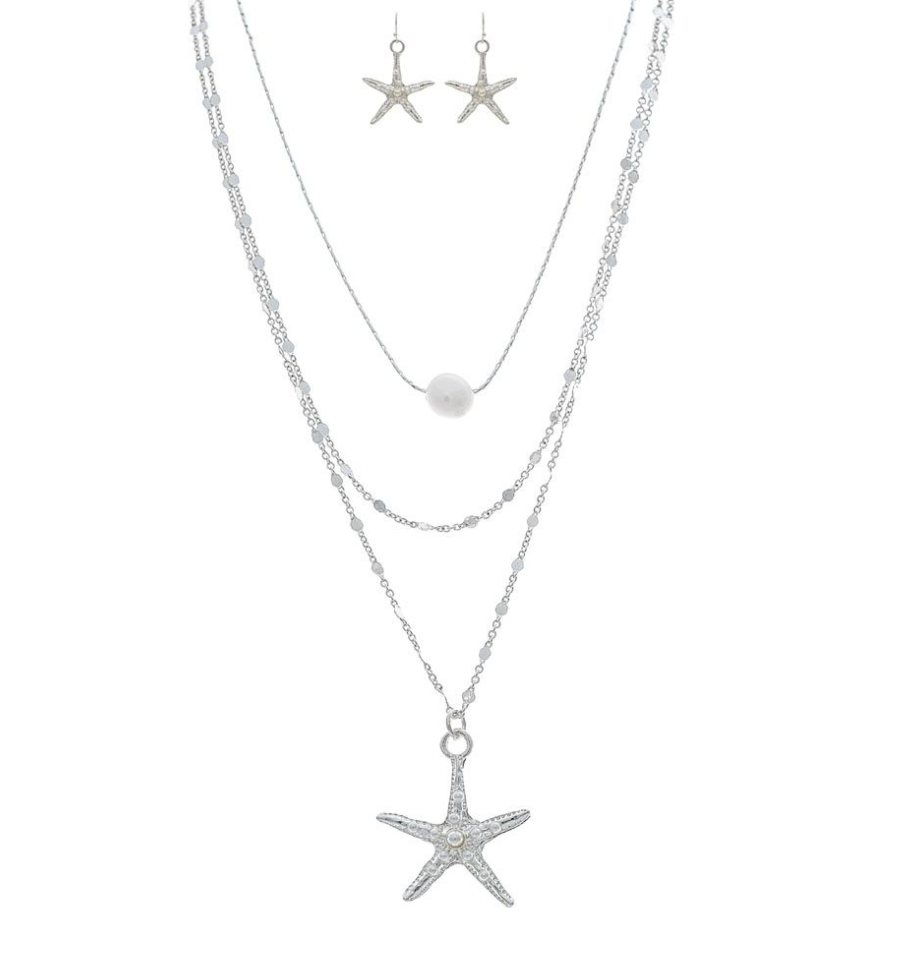 The A-Train Silver Freshwater Pearl Layer Chain Starfish Necklace Set features a three-layer necklace with a pearl and starfish pendants, plus matching silver starfish dangle earrings, all displayed on a white background.