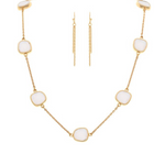A-Train’s Gold White Square Stations Chain Necklace Set features cushion-cut gemstones and matching gold drop earrings with delicate chains, offering a refined, modern minimalist look.