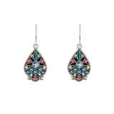 Elevate your look with the Filigree Drop Light Blue Earrings from Firefly Jewelry. These stunning handmade earrings by Firefly feature elegant teardrop shapes adorned with intricate filigree designs in shades of blue, pink, white, and black. Each earring is embellished with delicate gemstones and showcases a central light blue stone, adding a touch of sophistication to any outfit.