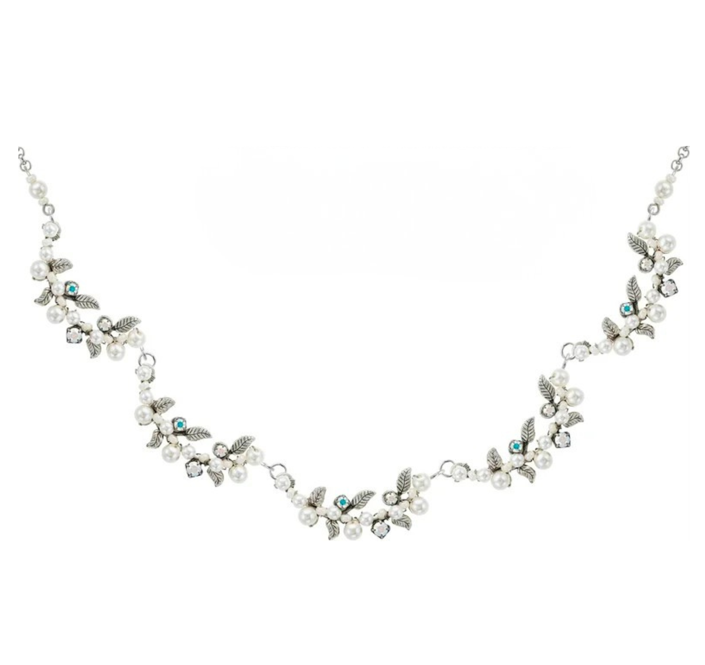 Introducing the Flora w/Glass Pearls White Necklace by Firefly—a delicate silver necklace adorned with leaf accents, shimmering glass pearls, sparkling crystals, and petite turquoise-tone stones. Handmade by Firefly Jewelry, this piece beautifully captures nature’s elegance in a graceful, nature-inspired design.