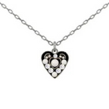 The Small Glass Pearl Heart Pendant White Necklace by Firefly features a silver chain and a heart-shaped pendant adorned with small white and clear stones in a circular pattern. This handmade piece from Firefly Jewelry exudes delicate charm and adds elegance to any look.