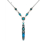 The Moonlight Linear Y Necklace Light Blue by Firefly features a central vertical pendant adorned with small round blue stones and intricate turquoise and blue bead accents along the chain. This beautiful necklace is handmade in Guatemala by Firefly.