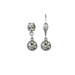 The Simple Drop Clear Crystal Earrings by Anne Koplik Designs, Inc. feature a silver-tone finish with clear round gemstones and a hook back—an elegant, timeless accessory for any occasion.