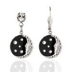 The Man in the Moon Black Background/Enamel & Stone Earrings by Anne Koplik Designs, Inc. feature a silver-plated moon face with black enamel, clear crystal accents, and a round gemstone detail.