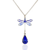 Anne Koplik Designs' Enamel/Crystal Blue Dragonfly w/ Sapphire Drop Necklace showcases silver-plated jewelry with blue and white enamel wings and a sparkling sapphire teardrop pendant.