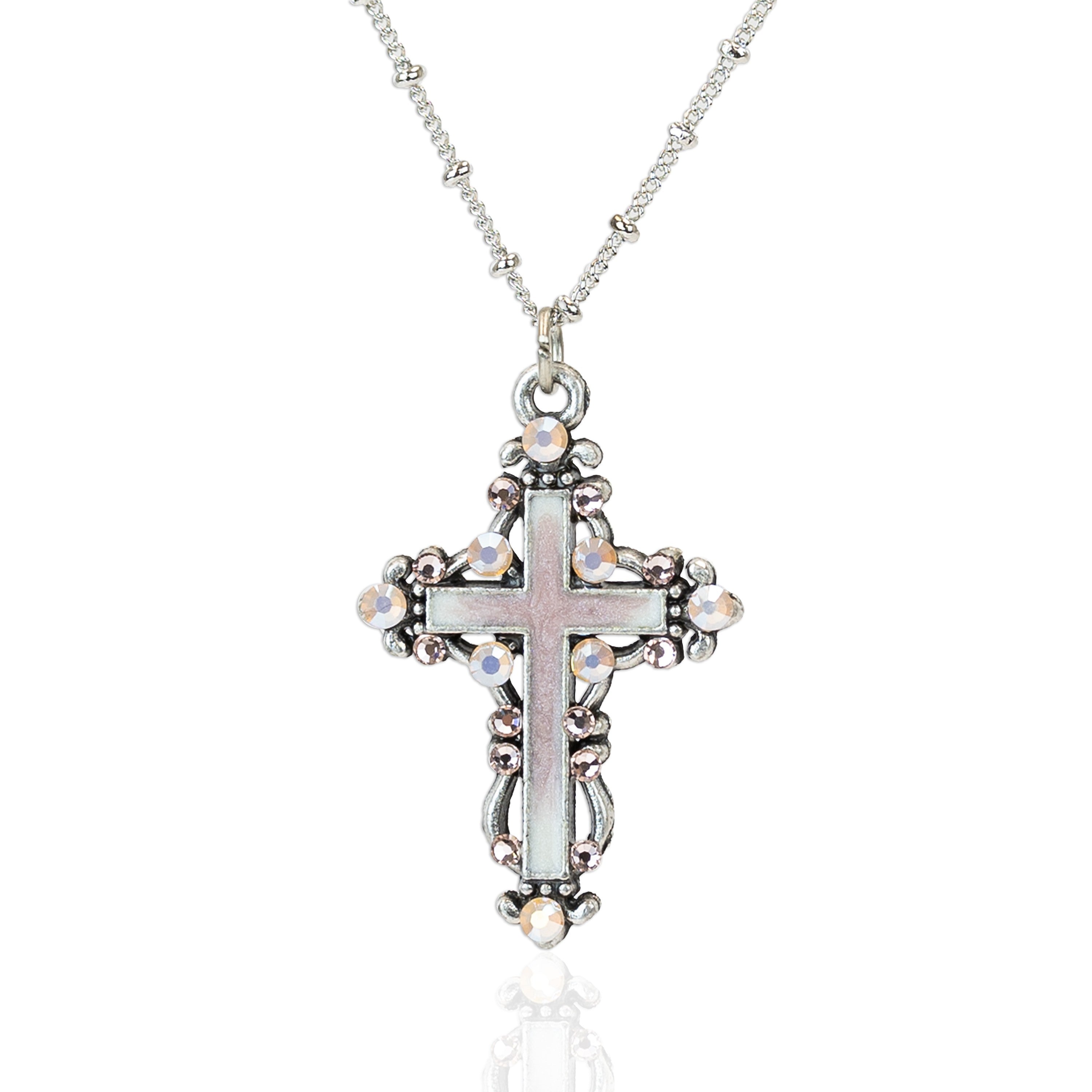 The Enamel & Stone Fancy Cross Pink Necklace by Anne Koplik Designs, Inc. features a pink-adorned cross pendant on an adjustable chain. This lead- and nickel-free piece is pictured on a white background, exuding timeless elegance and comfort.