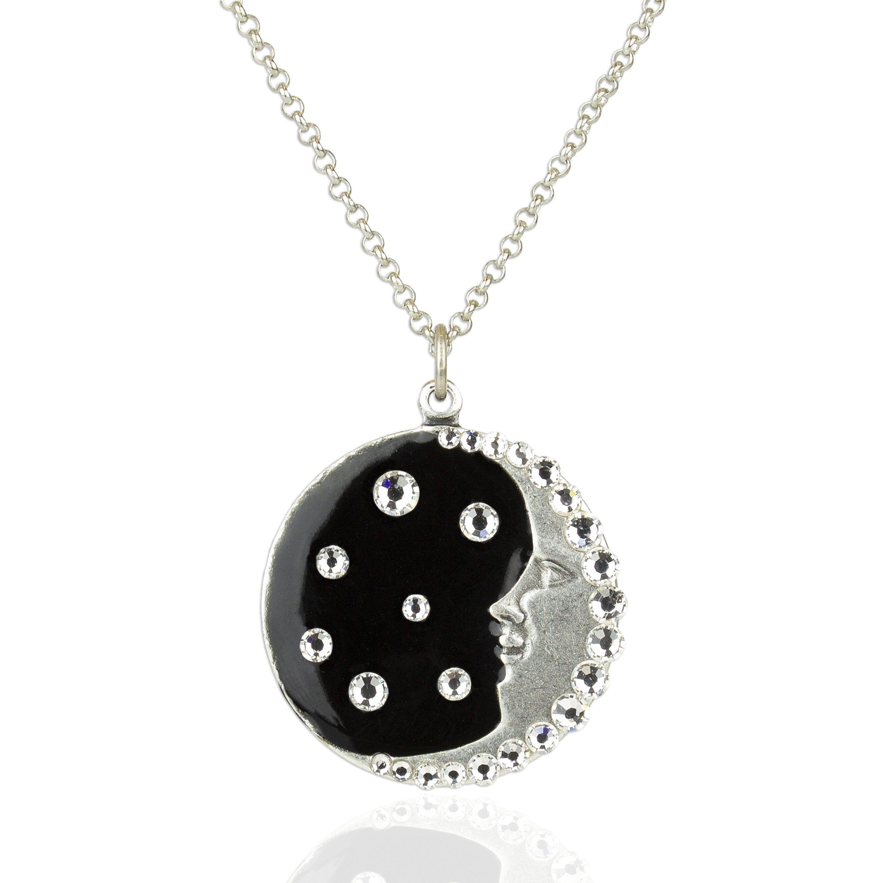 The Black & Crystal Crescent Moon Face w/Stars Necklace by Anne Koplik Designs, Inc. features a silver-plated brass round pendant with a crescent moon face, black enamel, sparkling rhinestones, and celestial crystal accents.